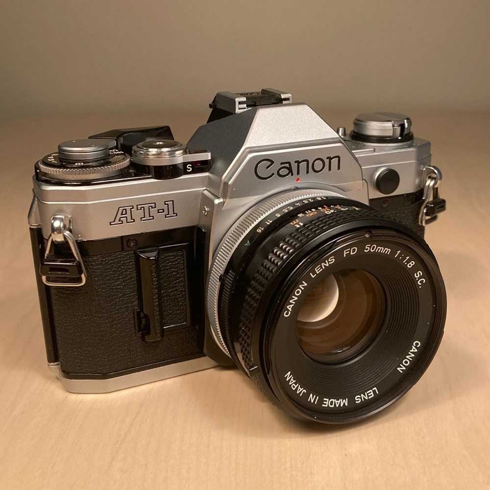 Canon AT-1 35mm Film Camera w/ FD 50mm f / 1.8 Lens (Tested + New Seals)